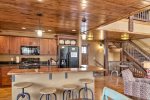 Gray  Goose Lodge kitchen with wood ceiling and floors. 